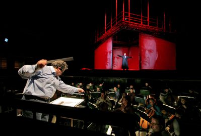 Carlo with the Orchestra and Bryn onstage in Dutchman 2006 credit Neil Bennett