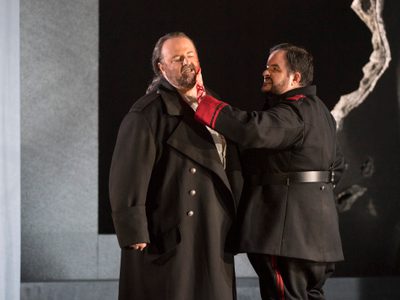 La Forza Del Destino Gwyn Hughes Jones Don Alvaro And Luis Cansino Don Carlo Di Vargas Photo Credit Richard Hubert Smith 5948 Richard Hubert-Smith 2018 One man is grimacing as another man touches his face.
