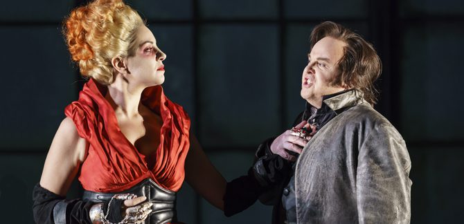 WNO Roberto Devereux Joyce El Khoury Elisabetta Barry Banks Roberto Devereux Photo credit Bill Cooper 0520 Bill Cooper 2019 Man holds woman's hand against his chest.
