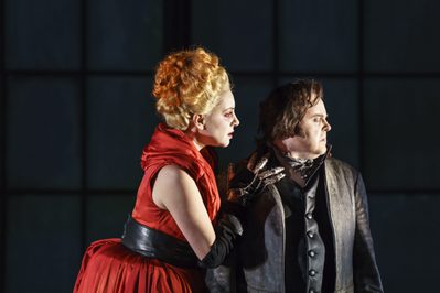 WNO Roberto Devereux Joyce El Khoury Elisabetta Barry Banks Roberto Devereux Photo credit Bill Cooper 0561 Bill Cooper 2019 Woman holds mans shoulder as he looks away from her.