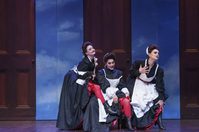WNO The Magic Flute Jennifer Davis First Lady Kezia Bienek Second Lady Emma Carrington Third Lady Photo credit Bill Cooper 0320 Bill Cooper 2019 Three maids show their red tights to the audience.