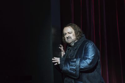 WNO Un ballo in maschera Gwyn Hughes Jones - Riccardo Photo credit Bill Cooper© 0752 Bill Cooper 2019 Man looks sad as he leans against wall.