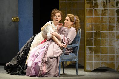 WNO The Marriage of Figaro Anna Harvey Cherubino and Anita Watson Contessa d Almaviva Photo credit Richard Hubert Smith1706 Richard Hubert-Smith 2020 Maid character leaning over seated woman both look shocked.