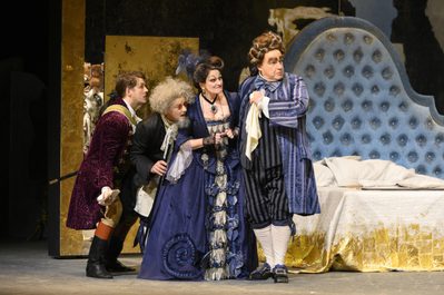 WNO The Marriage of Figaro L R Jonathan Mc Govern Richard Roberts Leah Marian Jones Henry Waddington Photo credit Richard Hubert Smith3370 Richard Hubert-Smith 2020 Four people leaning together peering at something out of shot.