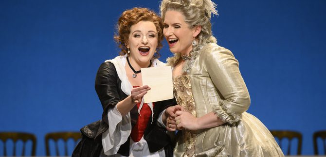 WNO The Marriage of Figaro Soraya Mafi Susanna and Anita Watson Contessa d Almaviva Photo credit Richard Hubert Smith2217 Richard Hubert-Smith 2020 Two women looking at a letter smiling.