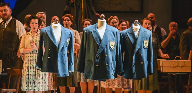 WNO Blaze of Glory Cast of Blaze of Glory photo credit Kirsten Mcternan 514 Blazers for a glee club are hung on the fitting manequin