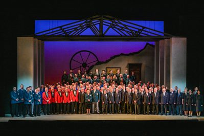 WNO Blaze of Glory Male Voices Choirs and Cast of Blaze of Glory photo credit Kirsten Mcternan 697 A gathering of Male Voice Choirs on the stage