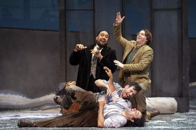 WNO La bohème Cast of La bohème photo credit Richard Hubert Smith 4100 Four friends joke and jest, tackling one another to the floor