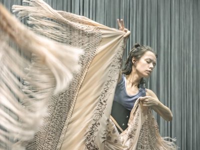 WNO Ainadamar Ensemble dancer photo credit Craig Fuller 5171 A woman dances with a beige shawl