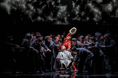 WNO Death in Venice Roderick Williams The Voice of Dionysus Mark le Brocq Gustav von Aschenbach and the Cast of Death in Venice photo credit Johan Persson 07449